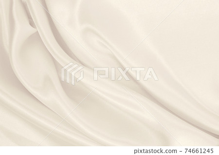 Smooth elegant golden silk or satin luxury cloth texture as wedding background. Luxurious background design. In Sepia toned. Retro style 74661245
