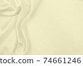Smooth elegant golden silk or satin luxury cloth texture as wedding background. Luxurious background design. In Sepia toned. Retro style 74661246