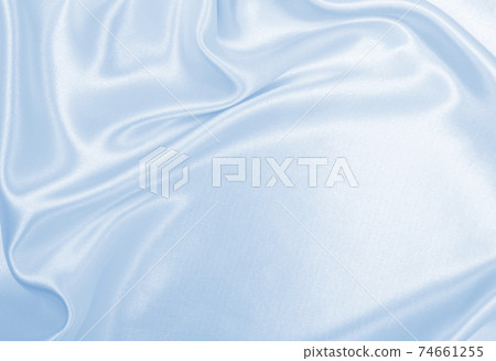 Smooth elegant blue silk or satin luxury cloth texture as abstract background. Luxurious background design Smooth elegant blue silk or satin luxury cloth texture as abstract background. Luxurious background design 74661255