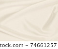 Smooth elegant golden silk or satin luxury cloth texture as wedding background. Luxurious background design. In Sepia toned. Retro style 74661257