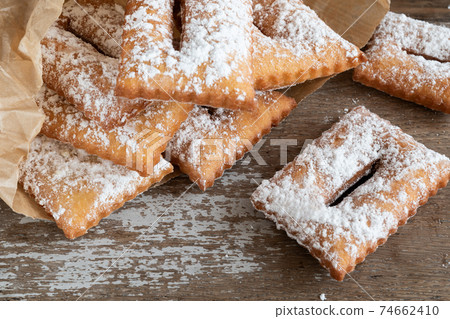 Homemade sweet typical french merveilles Homemade sweet typical french merveilles 74662410