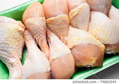 Fresh uncooked chicken meat drumsticks pieces, in package baget ready to cook 74662844
