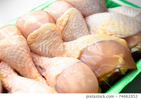 Fresh uncooked chicken meat drumsticks pieces, in package baget ready to cook 74662852