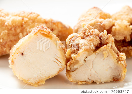 Fried chicken (cross section), comparison of chicken breast (left) and chicken thigh (right). Fried chicken (cross section), comparison of chicken breast (left) and chicken thigh (right). 74663747