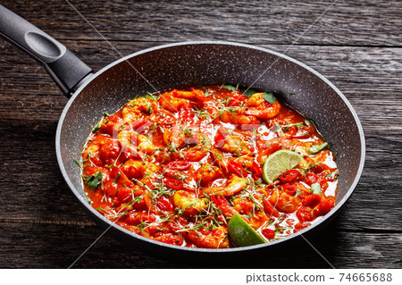 Prawn karahi - tomato shrimp curry, top view Prawn karahi - tomato shrimp curry, top view 74665688