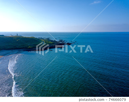 Aerial view of cape Fugueijiao, Shimen District, New Taipei, Taiwan. Aerial view of cape Fugueijiao, Shimen District, New Taipei, Taiwan. 74666079