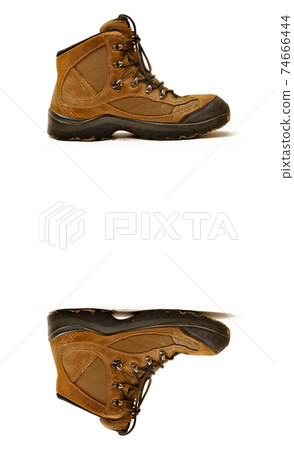 Hiking shoes and a white background, Sturdy hiking boots Hiking shoes and a white background, Sturdy hiking boots 74666444