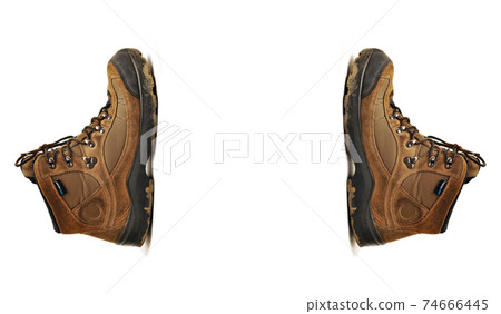 Hiking shoes and a white background, Sturdy hiking boots 74666445