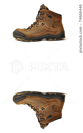 Hiking shoes and a white background, Sturdy hiking boots 74666446