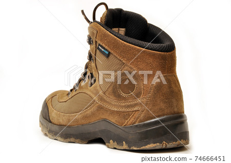 Hiking shoes and a white background, Sturdy hiking boots Hiking shoes and a white background, Sturdy hiking boots 74666451