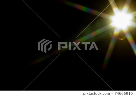 Abstract sun flare. The lens flare is subject to digital correction 74666910