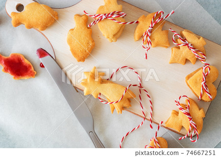 Baking with love for Merry Christmas. Baking Christmas cookies. Blue background table. Baking with love for Merry Christmas. Baking Christmas cookies. Blue background table. 74667251