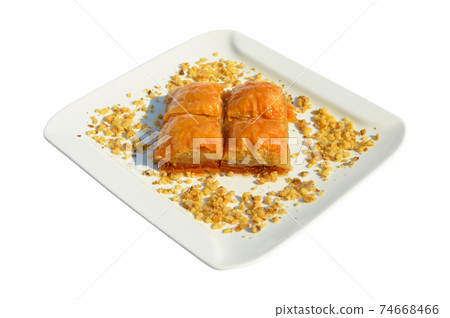 Baklava with walnut, one of the most beautiful desserts of Turkish cuisine Baklava with walnut, one of the most beautiful desserts of Turkish cuisine 74668466