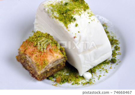 Cut Maras Ice Cream with pistachio Antep Baklava Cut Maras Ice Cream with pistachio Antep Baklava 74668467