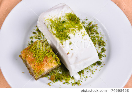 Cut Maras Ice Cream with pistachio Antep Baklava Cut Maras Ice Cream with pistachio Antep Baklava 74668468