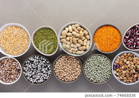 Different types of legumes in bowls Different types of legumes in bowls 74668836