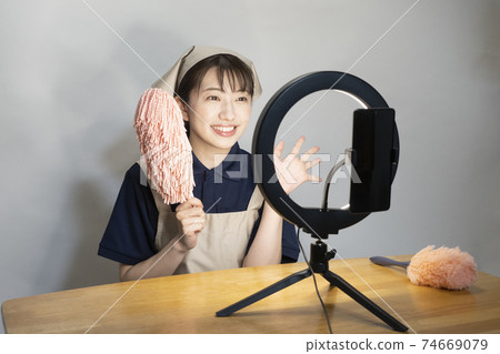 House cleaning woman teaching you how to clean on YouTube 74669079