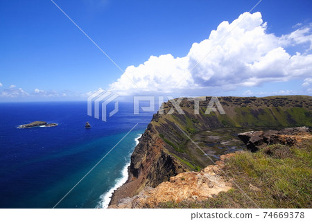 Easter Island in the South Pacific Ocean crater lake and ceremonial island of Mount Ranokau in Orongo Easter Island in the South Pacific Ocean crater lake and ceremonial island of Mount Ranokau in Orongo 74669378