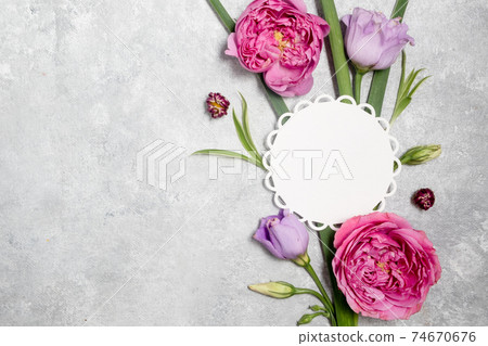 Floral arrangement and blank card on a white background. Mothers day Floral arrangement and blank card on a white background. Mothers day 74670676