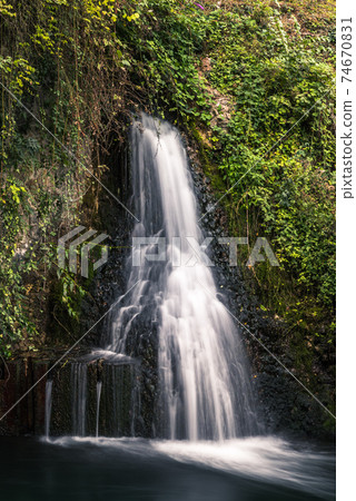Small waterfall next to the Rhine Falls, Neuhausen am Rheinfall, Canton Schaffhausen, Switzerland 74670831