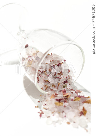 Miniature glass collapses and bath salts spill Miniature glass collapses and bath salts spill 74671309