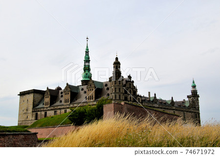 Kronborg Castle, a famous castle of world cultural heritage built on the outskirts of Copenhagen, Denmark, with an impressive green turret 74671972