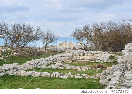 ruins of the ancient Greek city of Chersonesos on the seashore, overgrown with trees ruins of the ancient Greek city of Chersonesos on the seashore, overgrown with trees 74672872