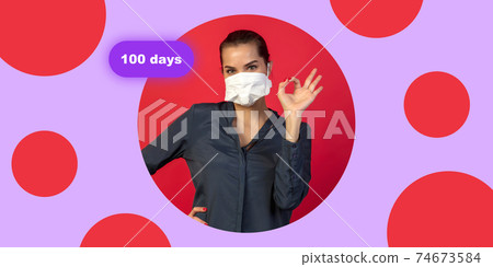 Woman in protective face mask on bright studio background. New rules of COVID spreading prevention 74673584