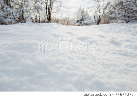 Snow texture. Winter background of snow and frost with free space for your decoration Snow texture. Winter background of snow and frost with free space for your decoration 74674375