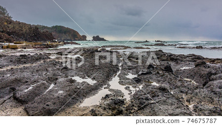 Ganmon rocks, Noto peninsula on Japan Sea, Japan. Ganmon rocks, Noto peninsula on Japan Sea, Japan. 74675787