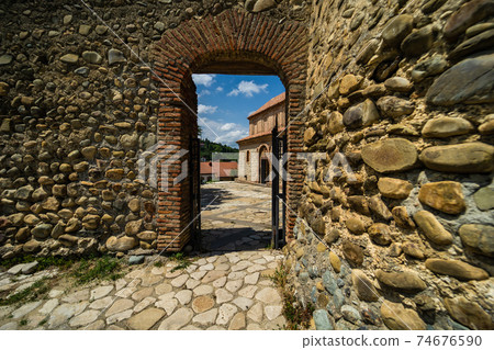 Street view of Old town of Sighnaghi with traditional georgian architecture, Kakheti, Georgia Street view of Old town of Sighnaghi with traditional georgian architecture, Kakheti, Georgia 74676590