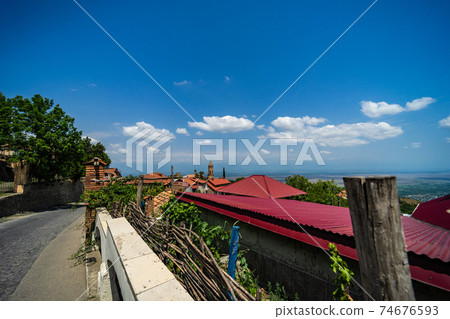 Street view of Old town of Sighnaghi with traditional georgian architecture, Kakheti, Georgia 74676593
