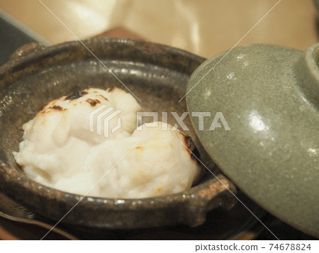 Grilled blowfish milt with salt Grilled blowfish milt with salt 74678824