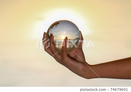 Catch the crystal ball with her finger 74679691