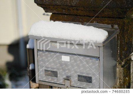 Post of a private house with snow Post of a private house with snow 74680285