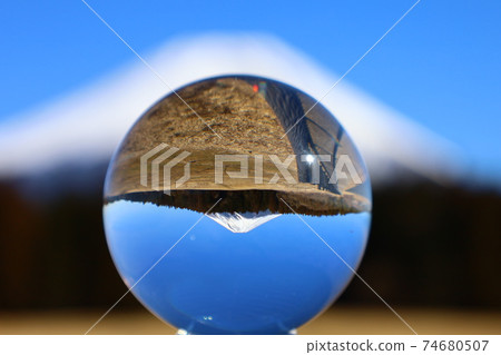 A view of Mt. Fuji, a World Heritage Site, seen through a glass ball 74680507