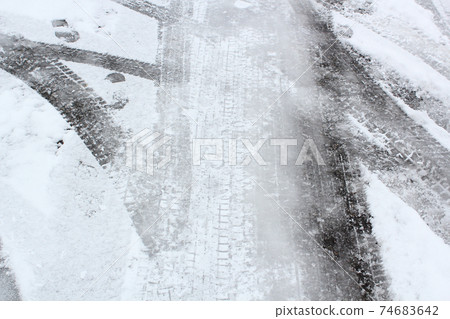 Crunchy winter roads treaded on tires Crunchy winter roads treaded on tires 74683642