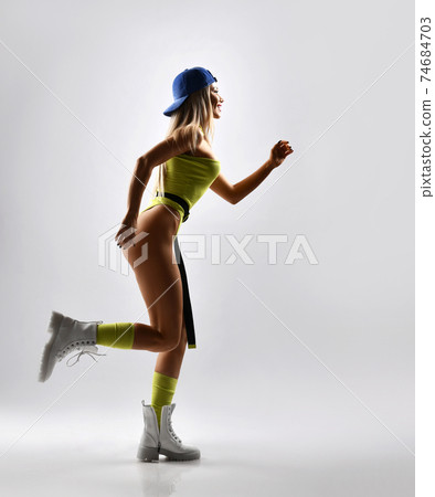 Happy sexy slim blonde woman fitness instructor 74684703