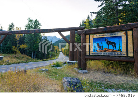 Entrance of the Bow Valley Parkway ( Highway 1A ) in autumn season. Banff National Park. Canadian Rockies. Banff, Alberta, Canada 74685019