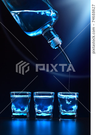 vodka on a black table vodka on a black table 74688627