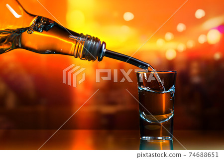 vodka on glass table in bar 74688651
