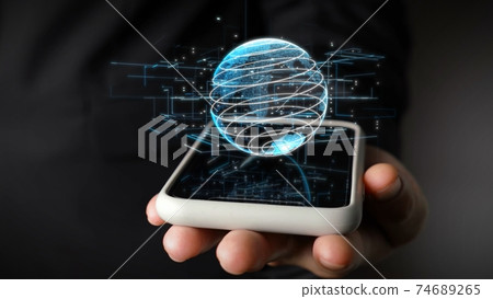 Human hand holding mobile phone with earth globe holographic technology 74689265