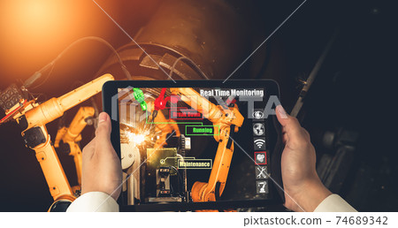 Engineer controls robotic arms by augmented reality industry technology Engineer controls robotic arms by augmented reality industry technology 74689342
