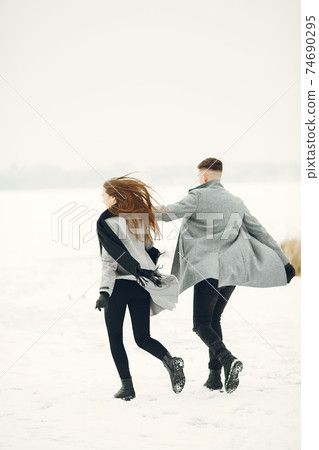 Winter snow couple love story Winter snow couple love story 74690295