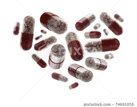 Capsules with the drug in the shape of a heart on a white background Capsules with the drug in the shape of a heart on a white background 74691058