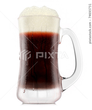 Frosty glass of fresh stout beer with bubble froth isolated on white background. Frosty glass of fresh stout beer with bubble froth isolated on white background. 74693731