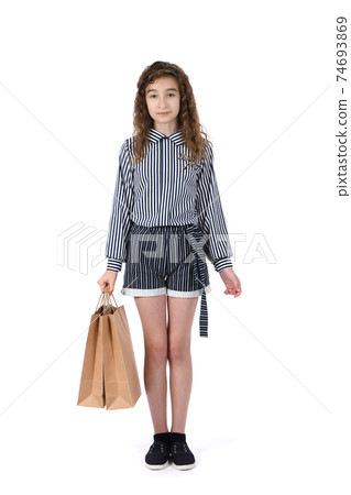 Child with a packet isolated on white Child with a packet isolated on white 74693869