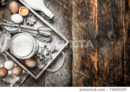 Baking background. Ingredients for fresh dough. Baking background. Ingredients for fresh dough. 74695097