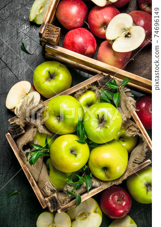 Fresh apples in boxes. Fresh apples in boxes. 74696149