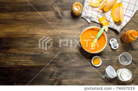Baby food. Baby puree from fresh pumpkin. Baby food. Baby puree from fresh pumpkin. 74697039